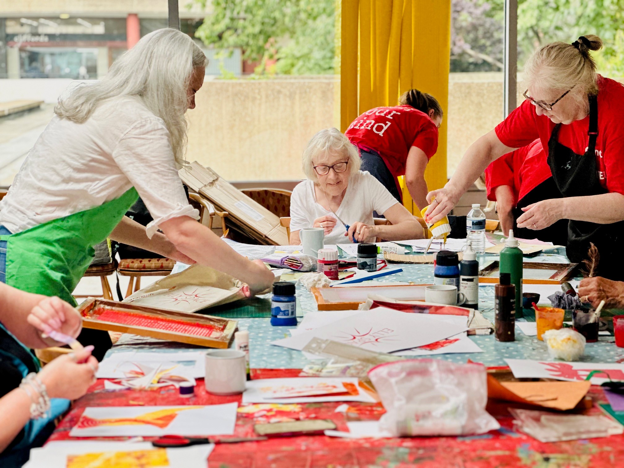Participants creating artwork on one of our projects