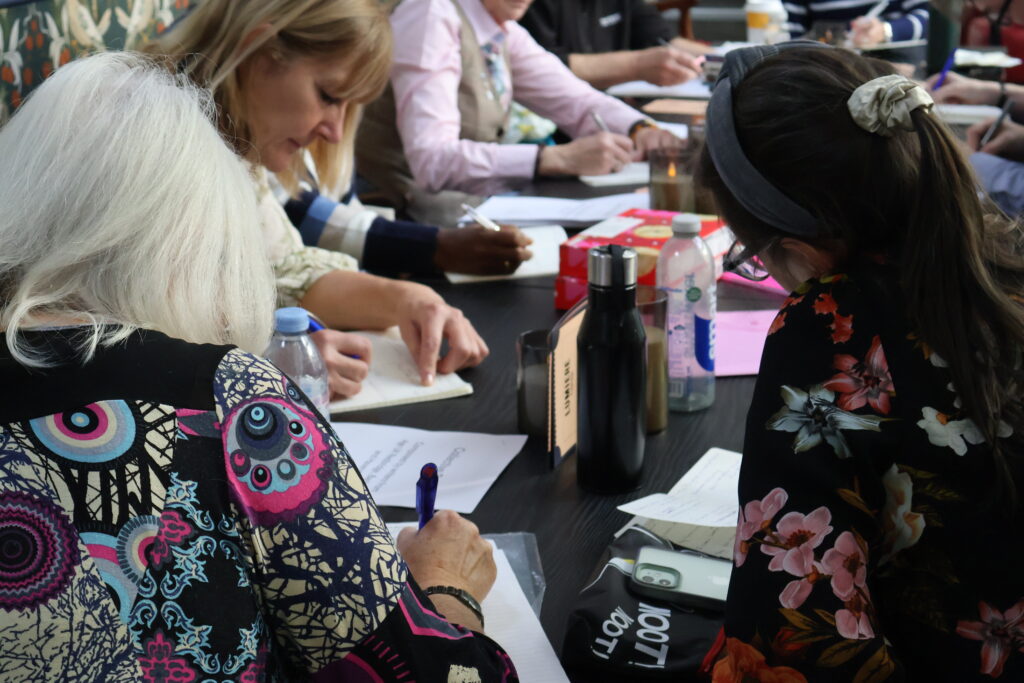 Older adults taking part in a creative writing art:links project.