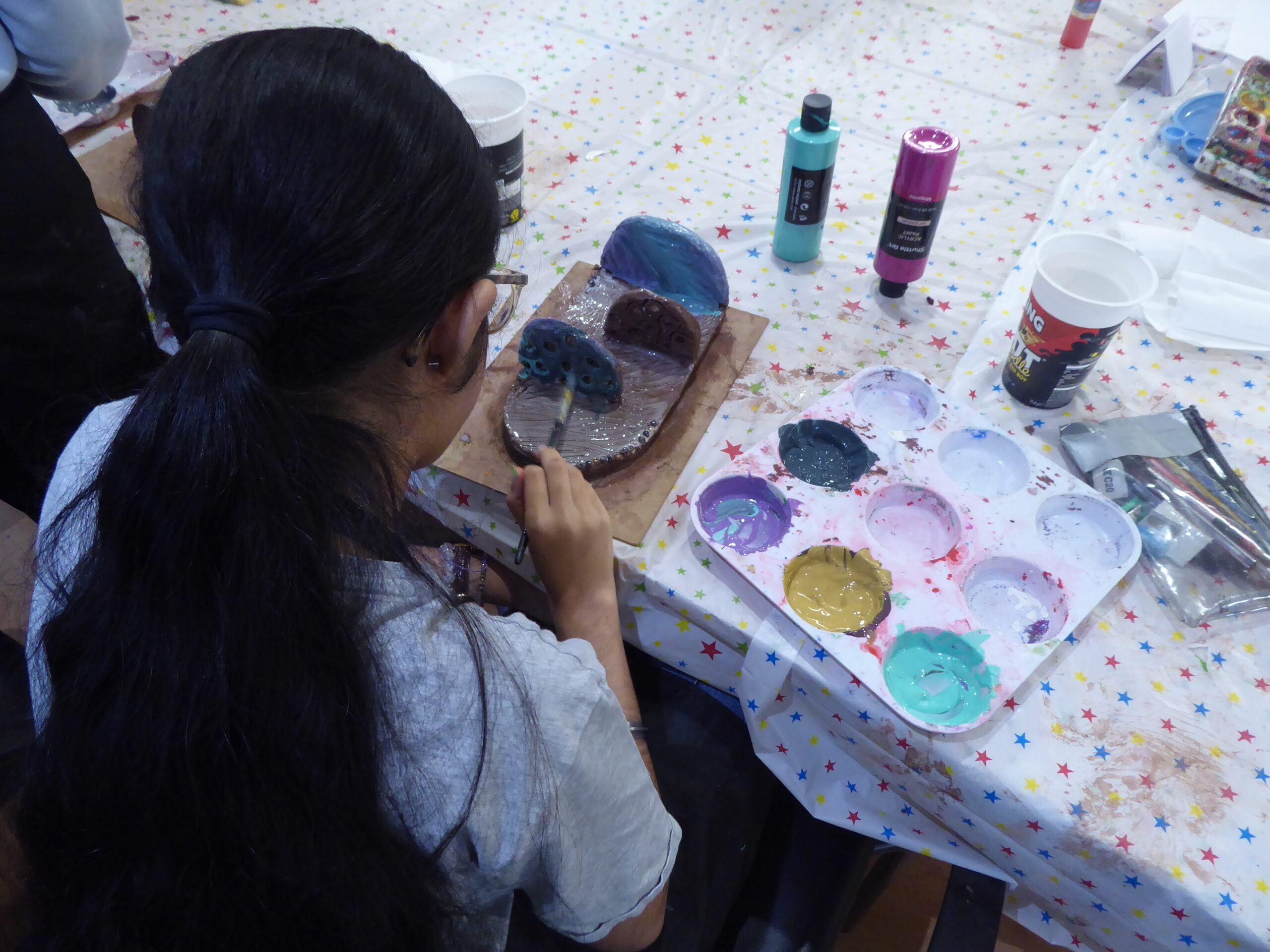 Young carers taking part in a ceramics project.