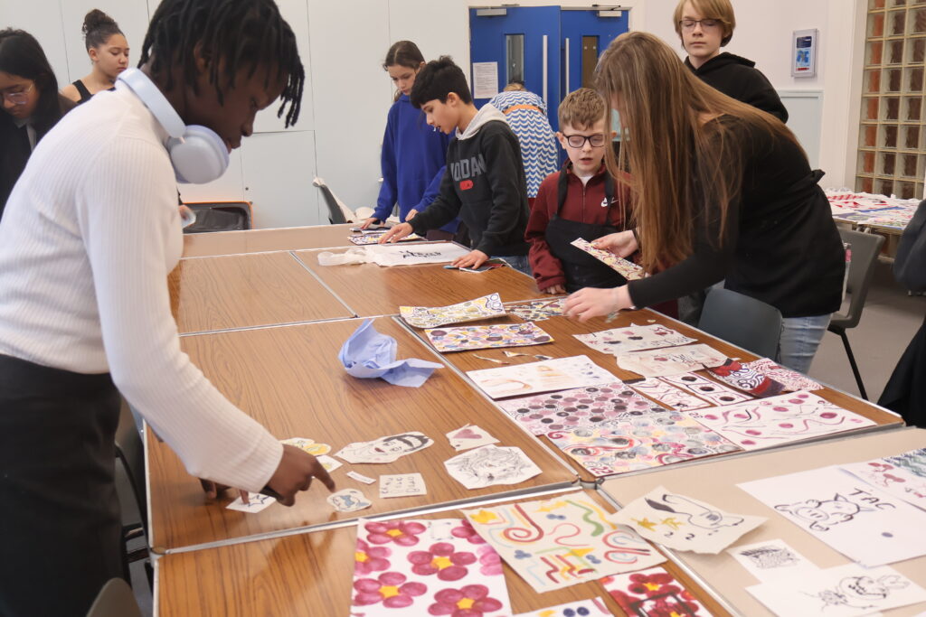 Young carers displaying their visual artwork.