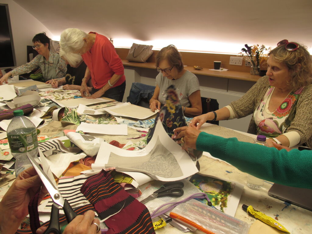 Older adults taking part in a collage workshop