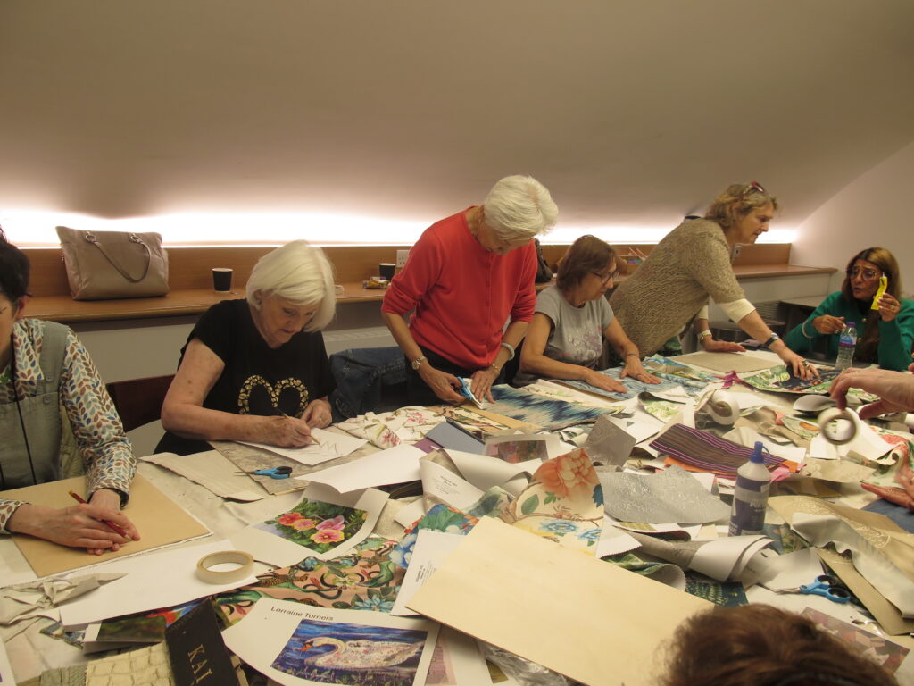 Older adults taking part in a collage workshop