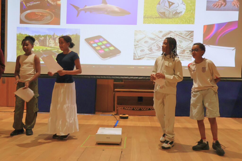 Young carers reading their collaborative poem at the inspired:arts showcase in Hammersmith.